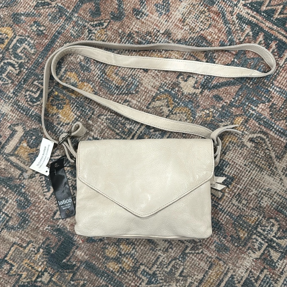 Never used Latico Crossbody Purse, genuine leather, color- oat